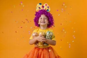 girl-with-clown-costume-candy